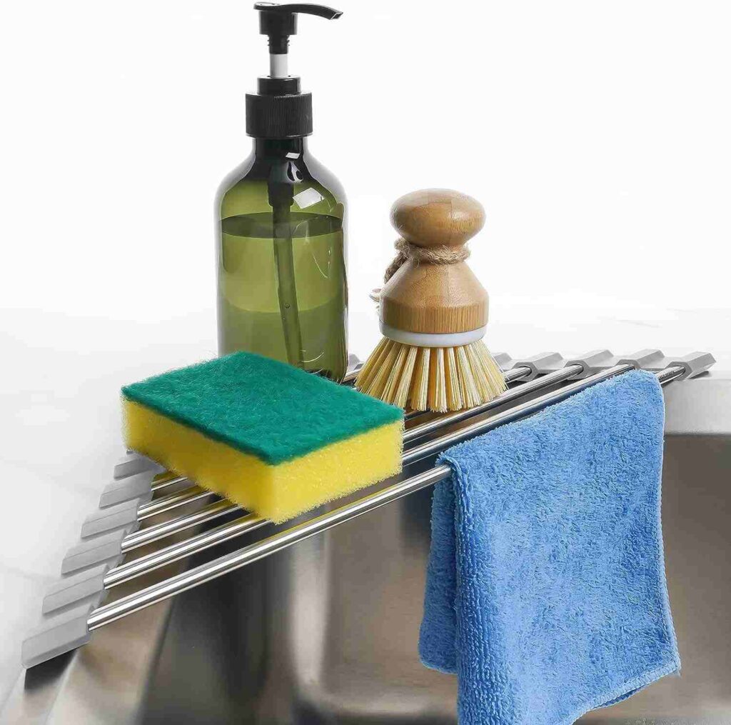  water shower bottle, scotch bread, handkerchief and brush are on dish rack